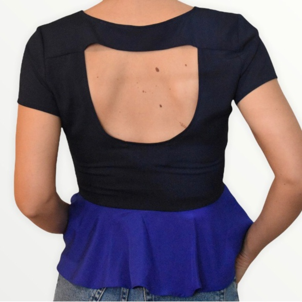 Forever21 Rory Beca cut out back peplum blouse